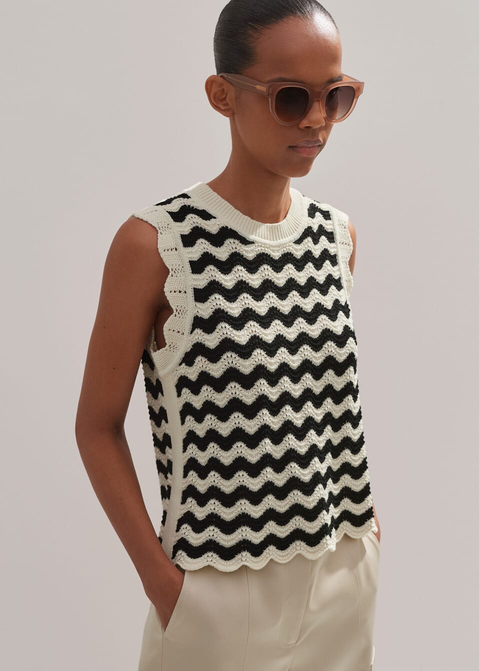Me + Em black and white knitted vest with a sleeveless silhouette with round neck.