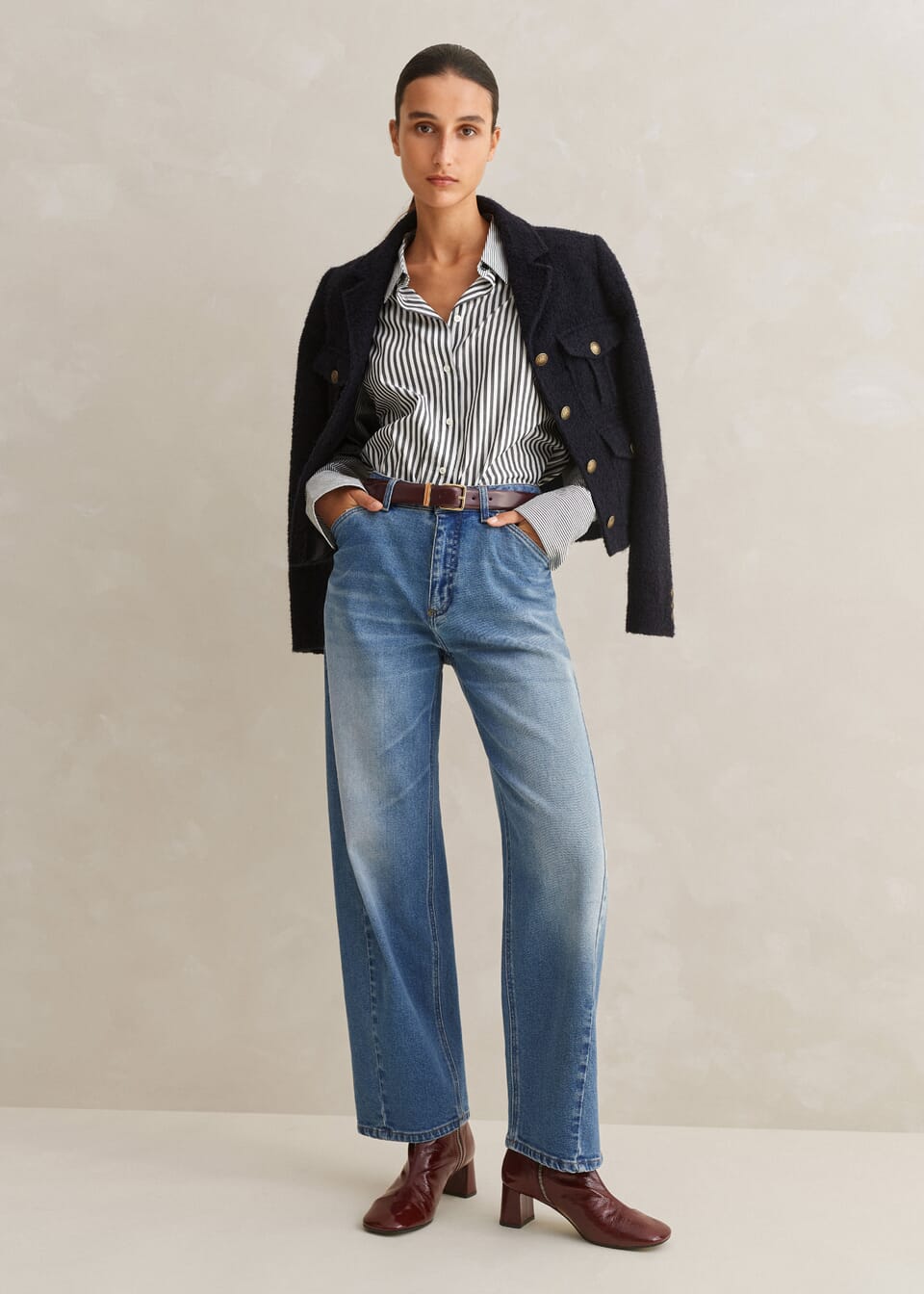 Me + Em's twisted seam jeans are bang on trend for 2024. They have just the right amount of fading over the thighs, a flattering high-rise waist and ankle-length silhouette, this made-in-Italy jean is a timeless wardrobe investment.