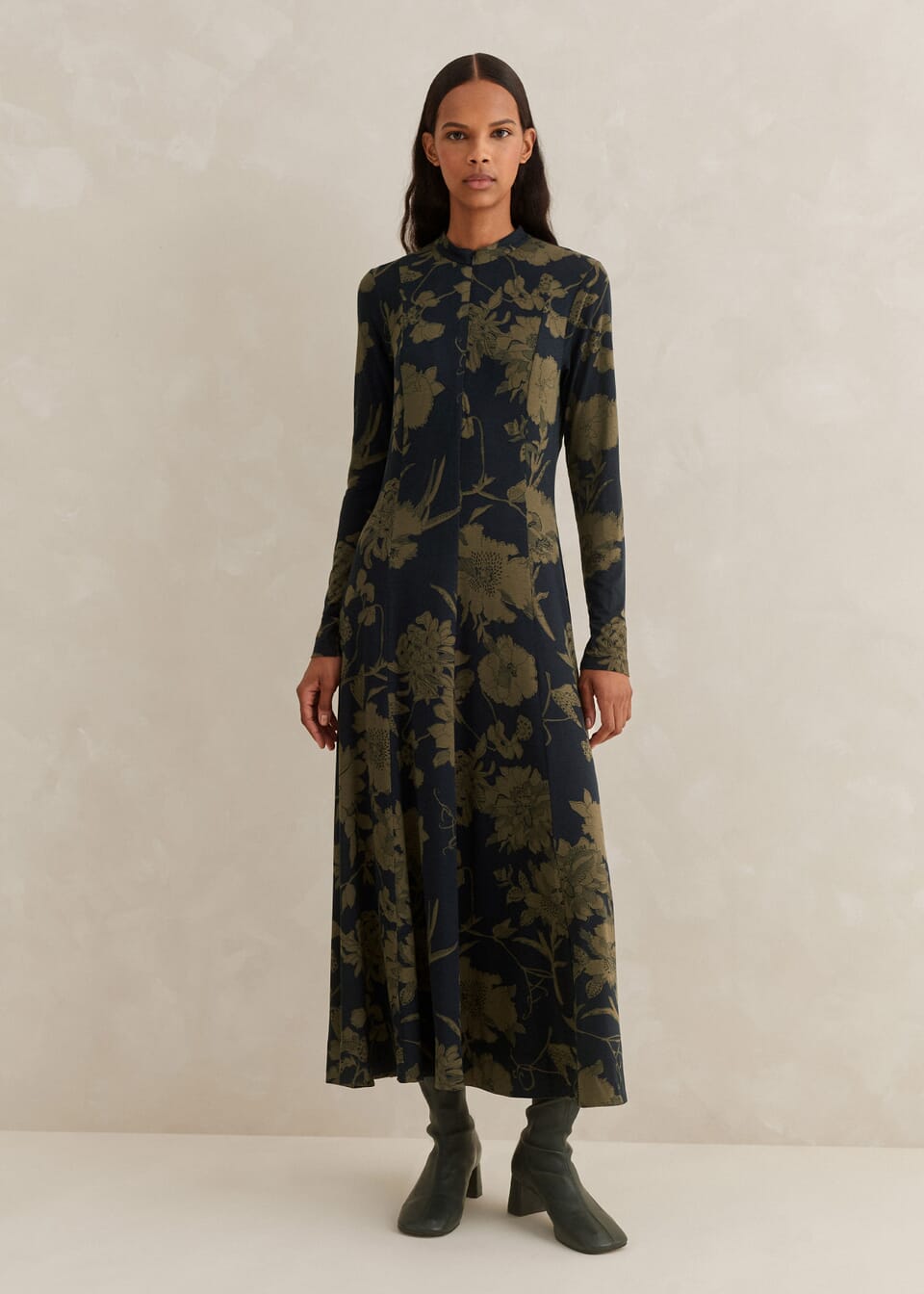 Cementing floral prints in your autumn wardrobe, this long-sleeved dress features our bespoke Scribble Flower print in a combination of navy and khaki set on a black backdrop.