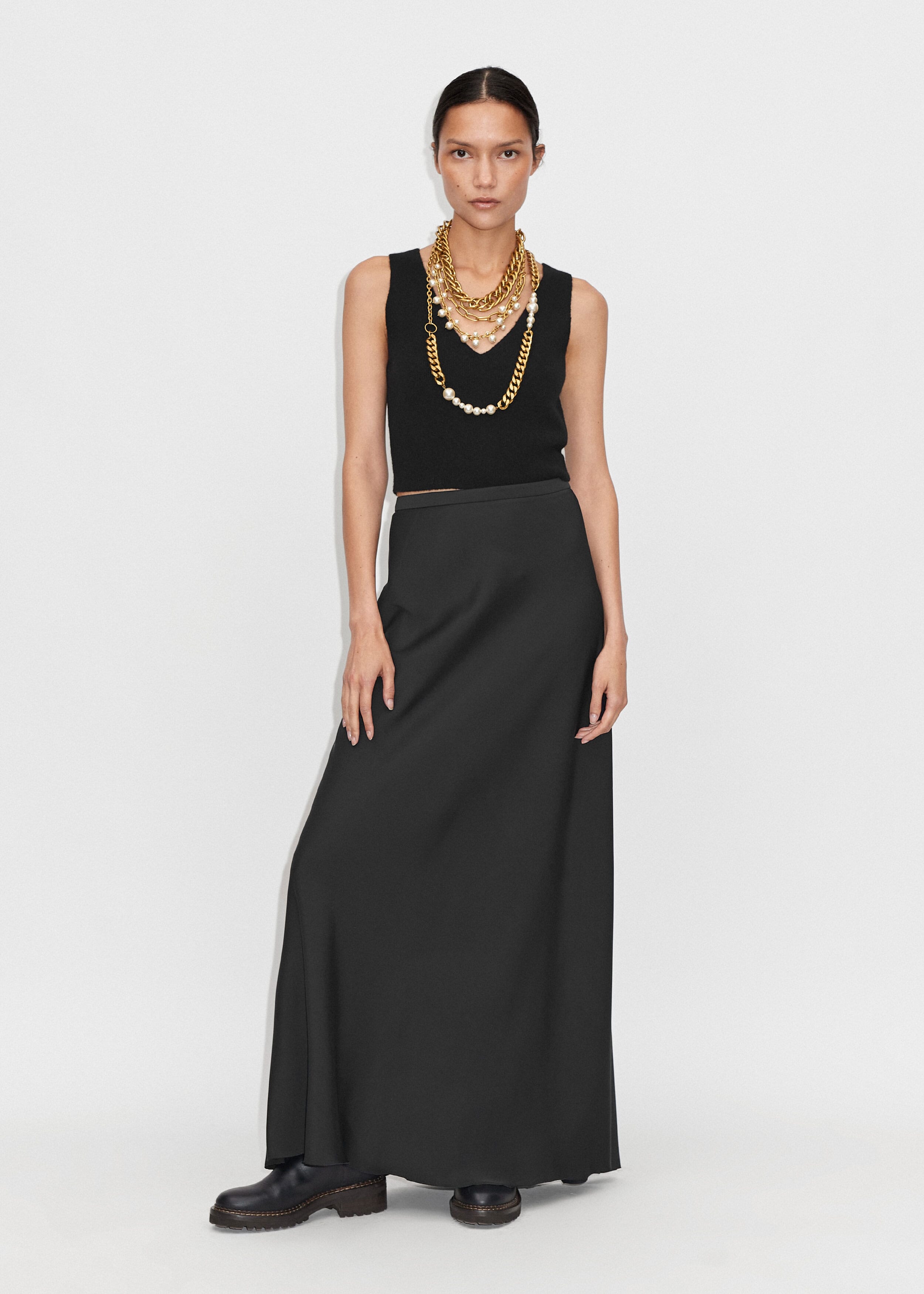Me + Em black maxi skirt. This black Satin Fishtail Full-Length Maxi Skirt
is made from Recycled Satin-Back Crepe with a side zip fastening. 
