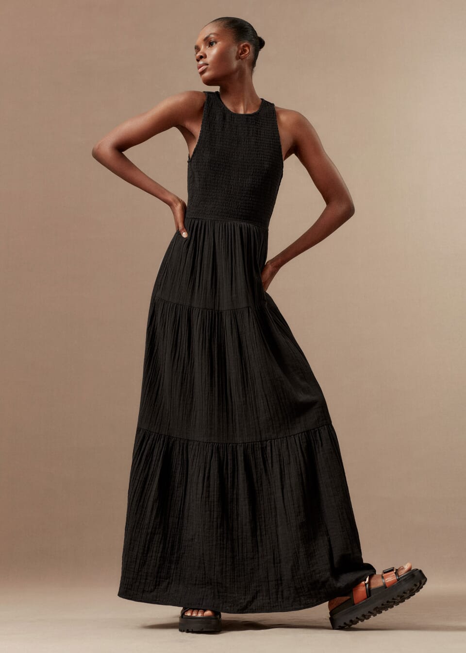 Black summer dresses are the versatile and easy way to get dressed on hot summer days! A classic, clean-cut staple that forms the basis of day and dusk outfitting, this Me + Em black maxi dress is crafted from cheesecloth in a versatile black hue and heroes a flattering halterneck silhouette.